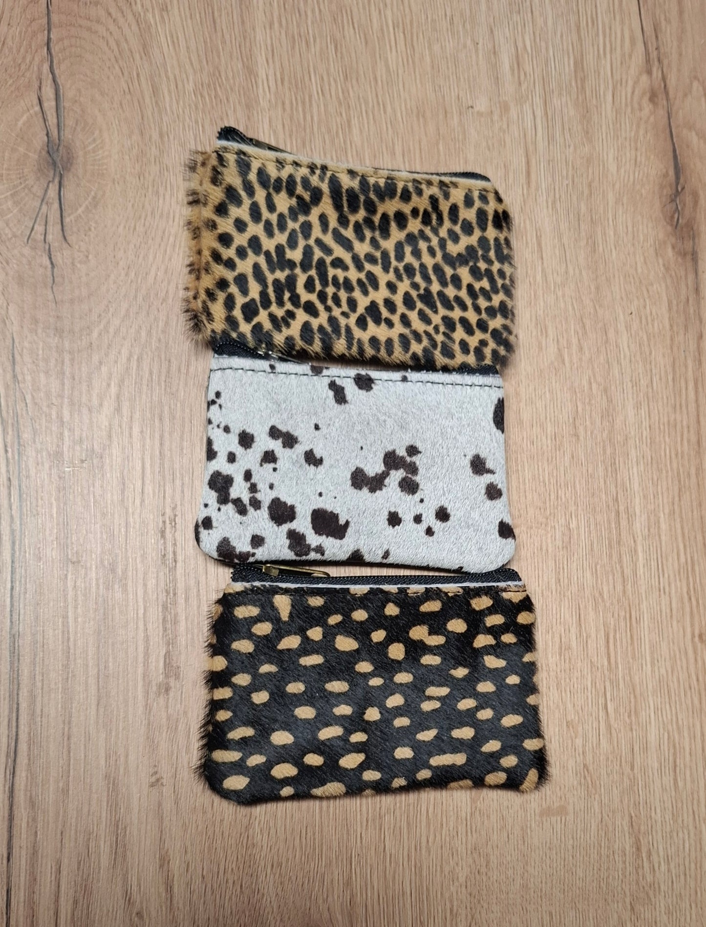 Monedero de piel con pelo animal print