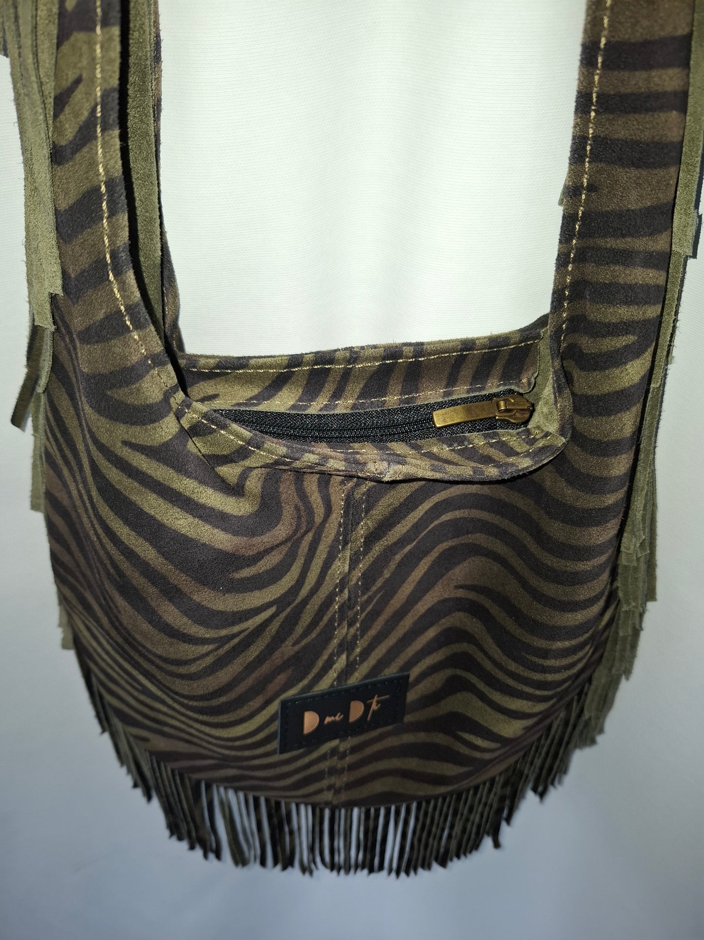 Bolso SOTO serraje flecos estampado cebra