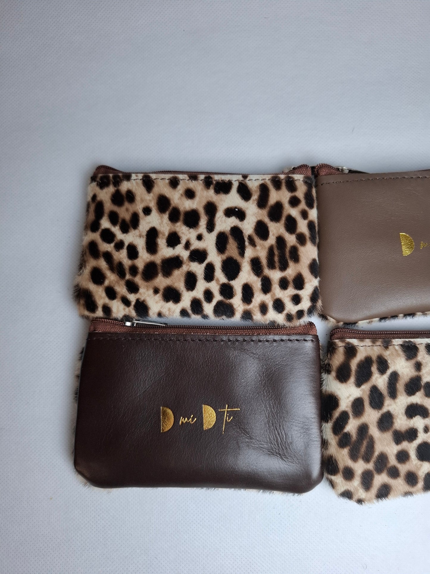 Monedero de piel con pelo print guepardo