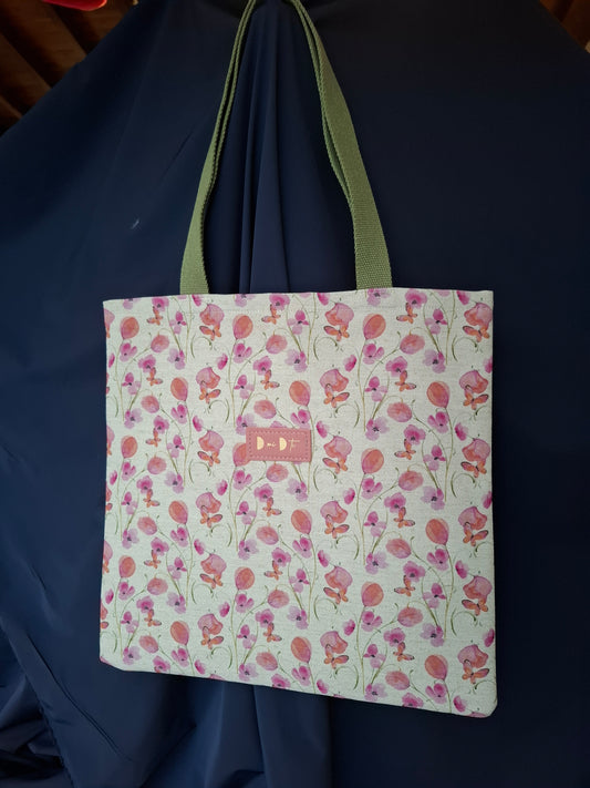 Bolsa IGUÑA flores y mariposas rosas