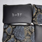 Monedero de piel estampado serpiente azul y beige