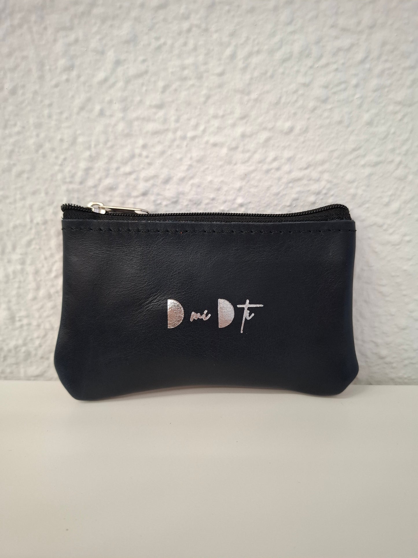 Monedero de piel berenjena estampado avestruz