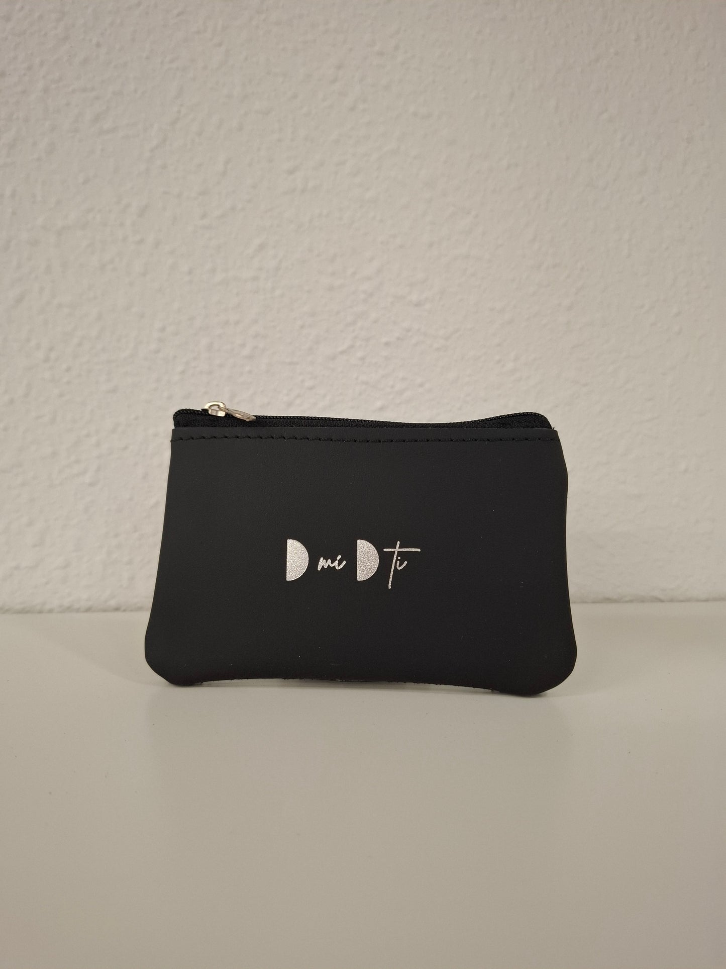 Monedero de piel estampado serpiente negro azul beige