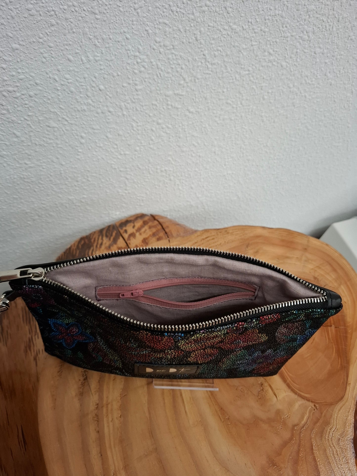 Bolso de mano DOBRA piel flores brillo negro