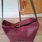Bolso IGUÑA piel avestruz berenjena