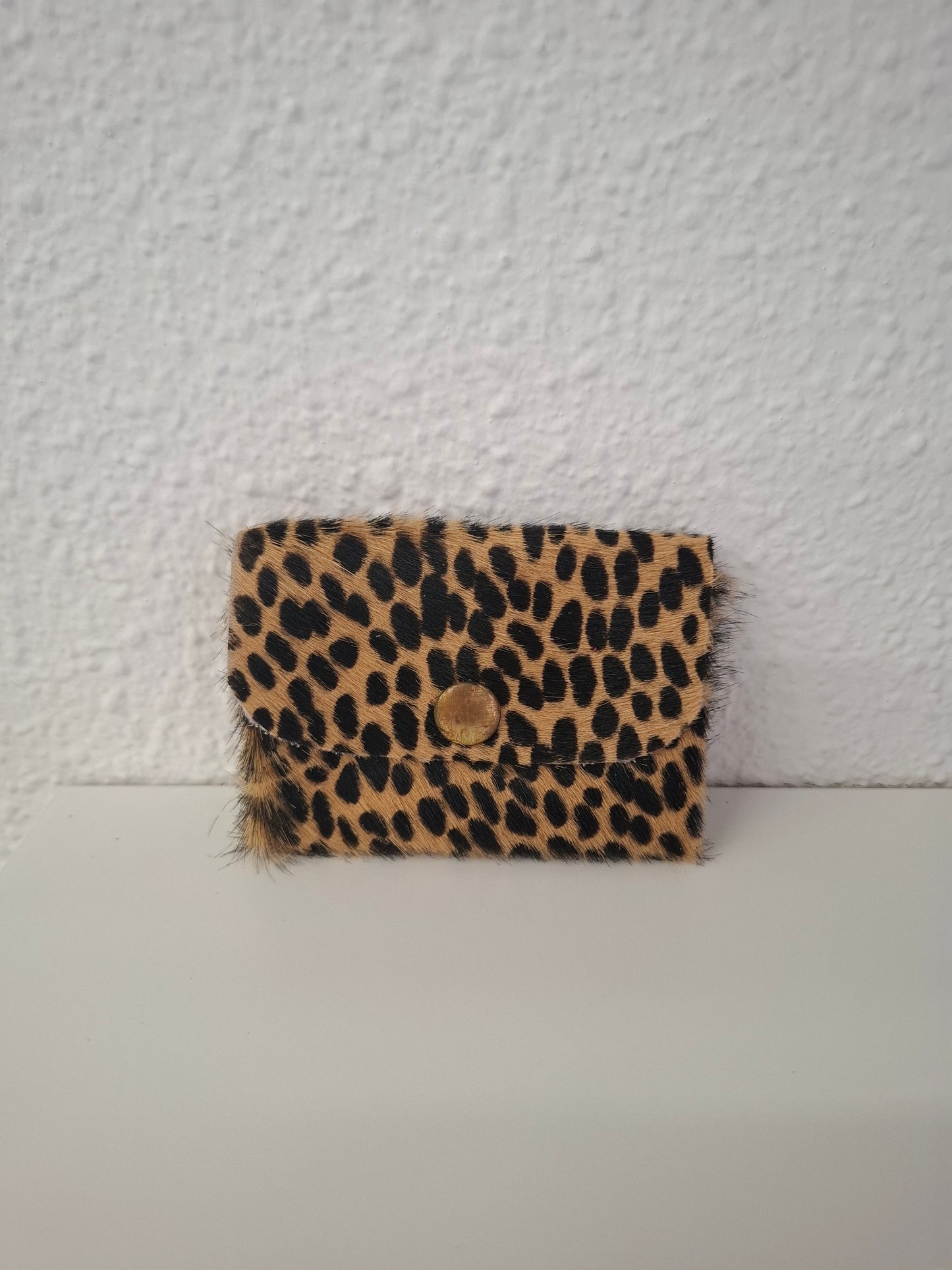 Monedero corchete piel con pelo dálmata marrón