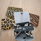 Monedero doble corchete piel con pelo animal print