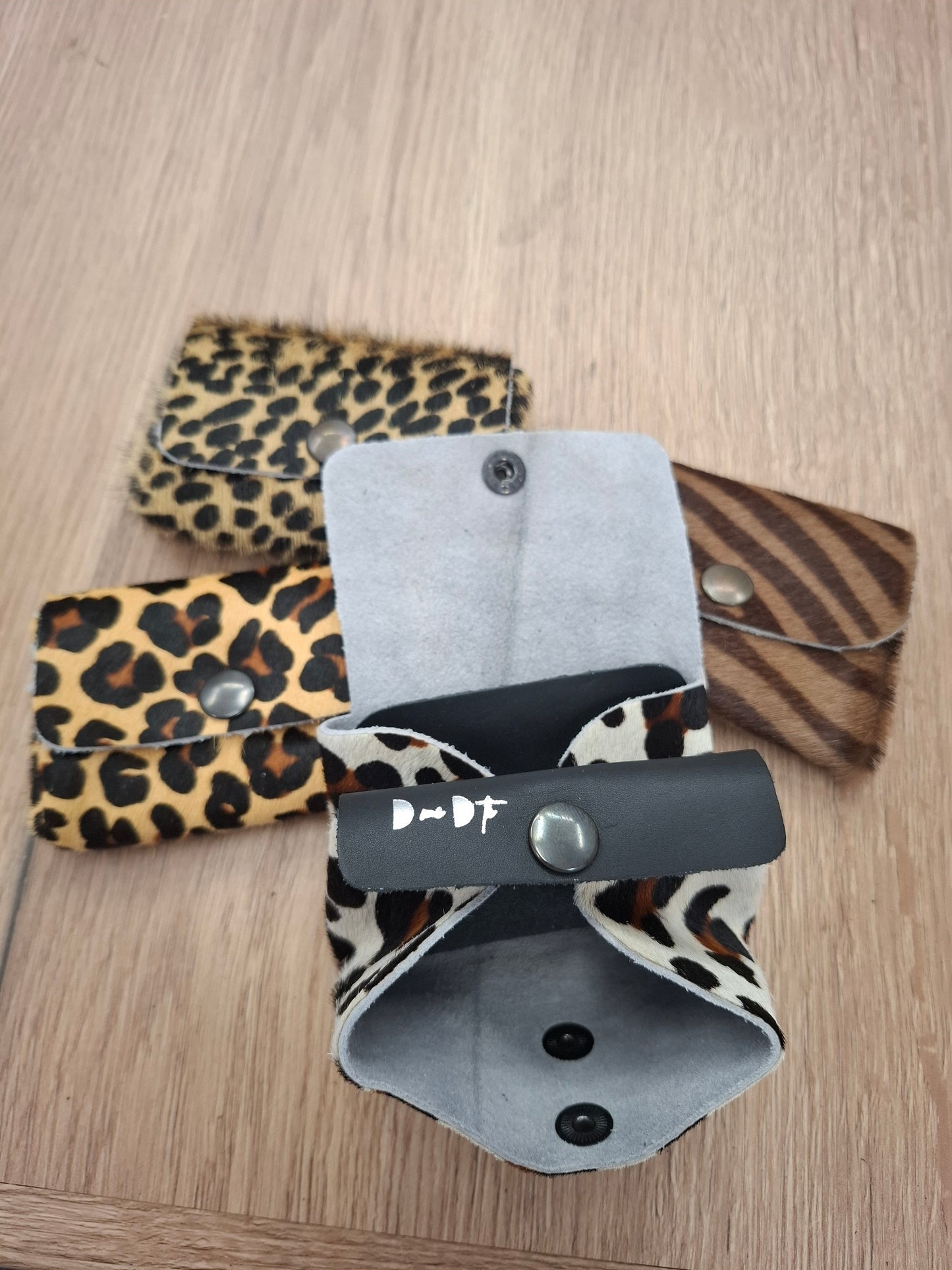 Monedero doble corchete piel con pelo animal print