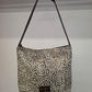 Bolso IGUÑA piel con pelo dálmata marrón