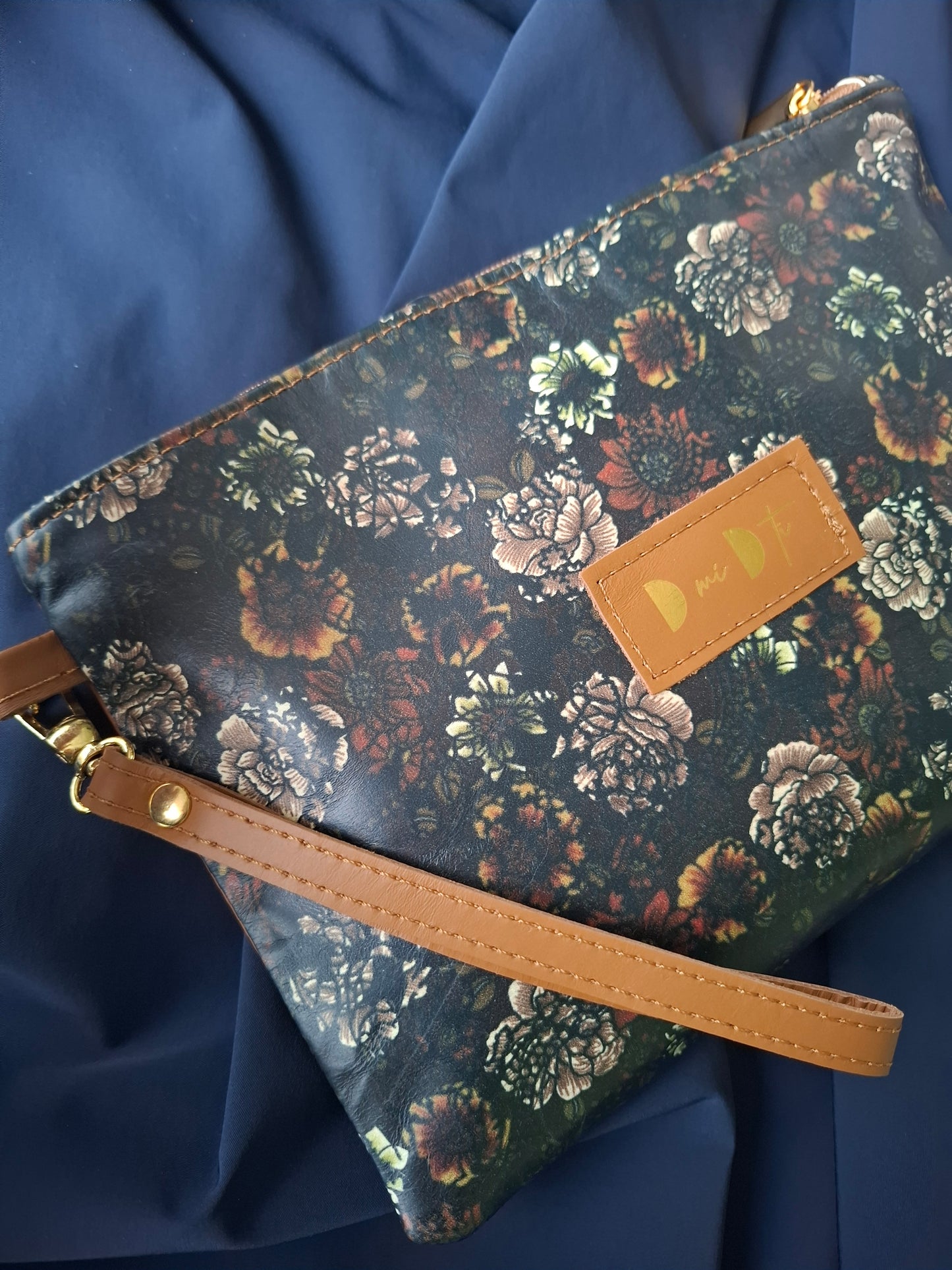 Bolso de mano DOBRA piel estampado flores negro y marrón