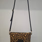 Bolso bandolera DOBRA piel con pelo leopardo amarillo y negro