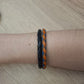 Pulsera piel doble negro, naranja y azul