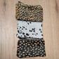 Monedero de piel con pelo animal print