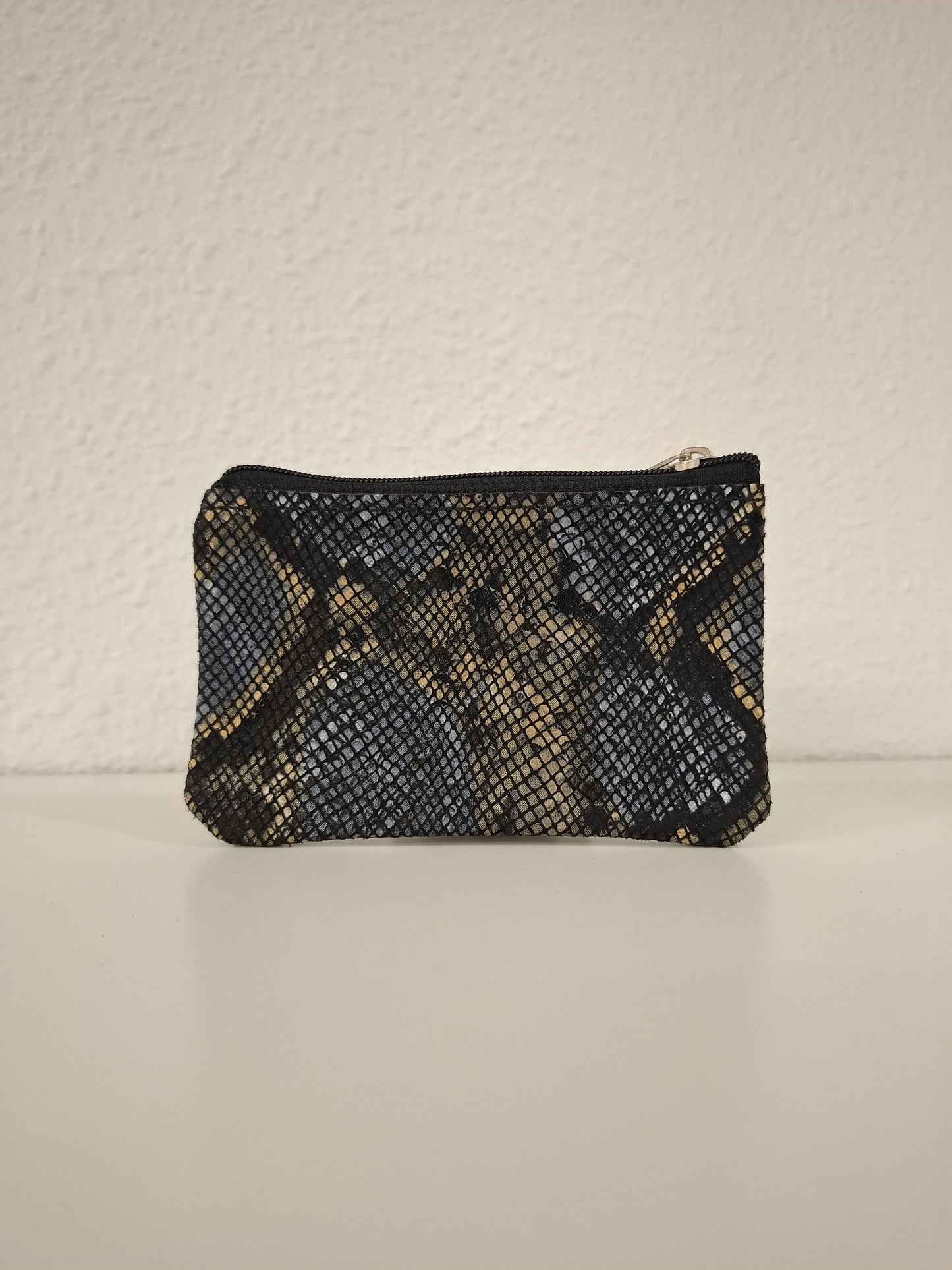 Monedero de piel estampado serpiente negro azul beige