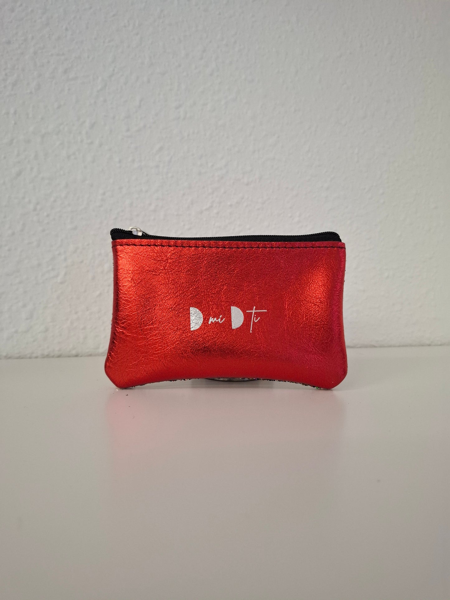 Monedero glitter y piel metalizada