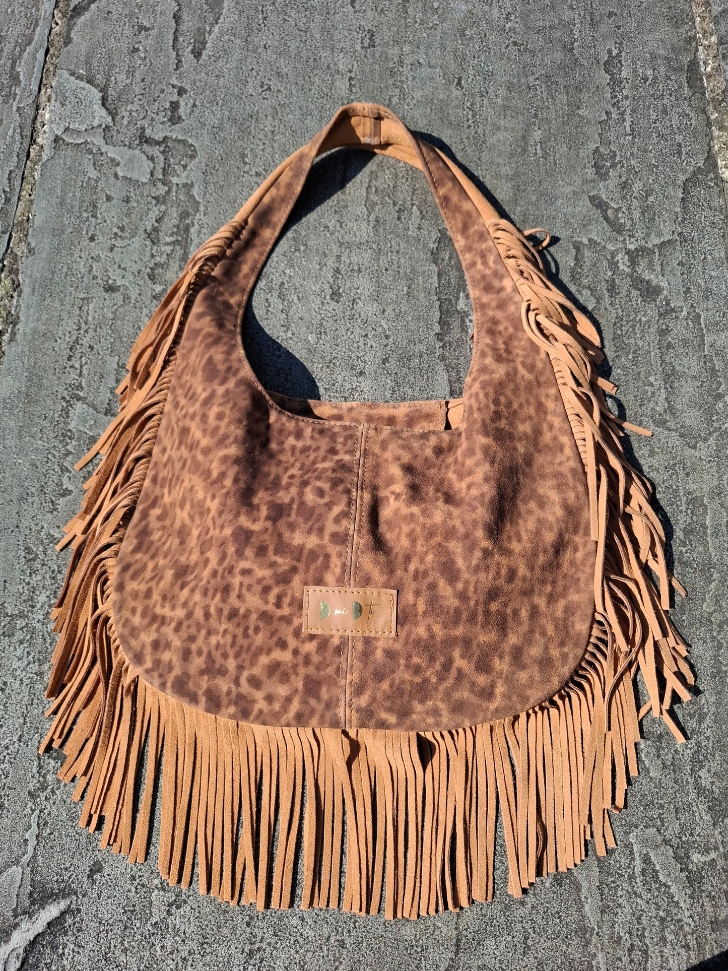 Bolso SOTO serraje flecos estampado leopardo camel