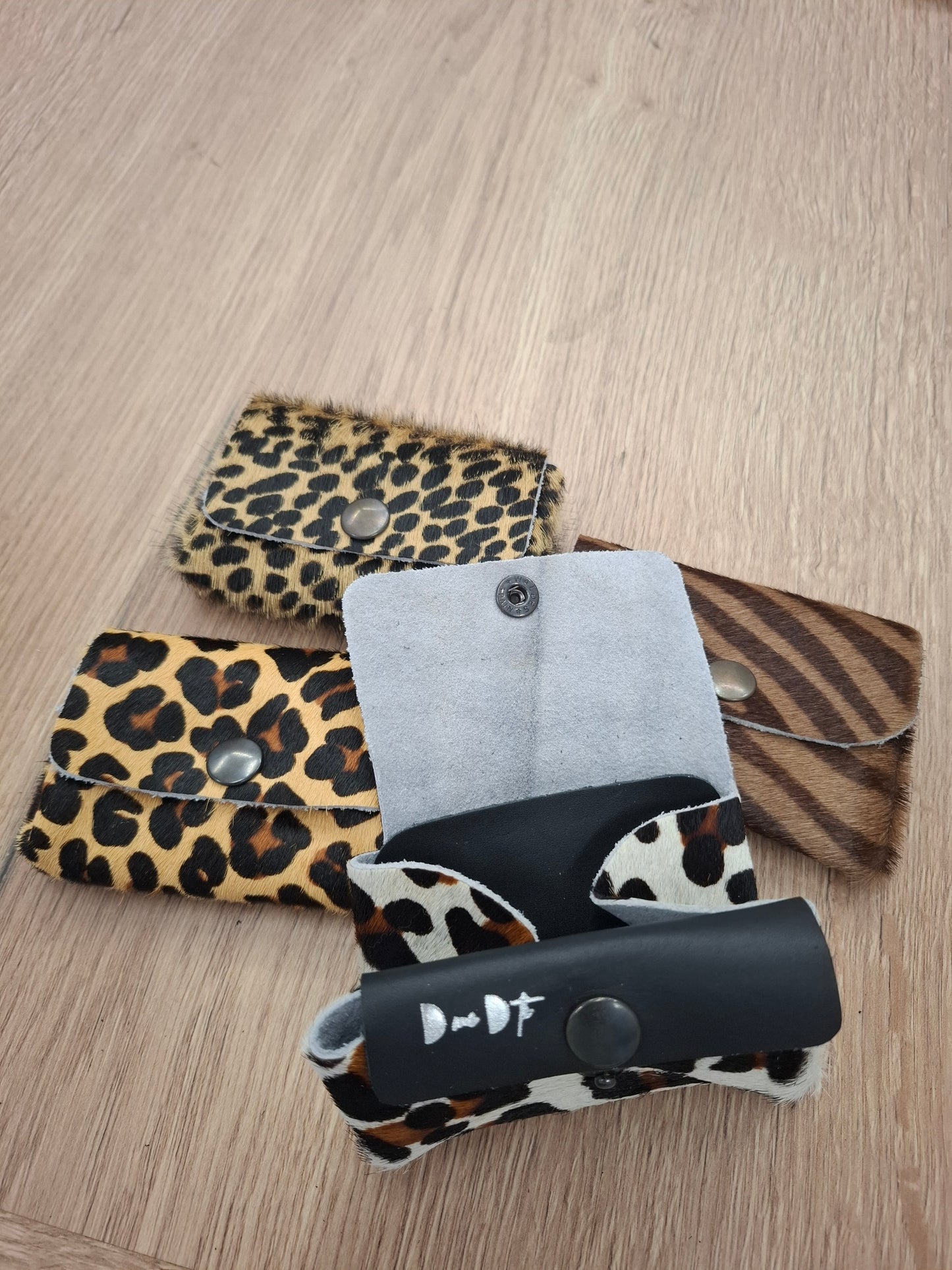 Monedero doble corchete piel con pelo animal print
