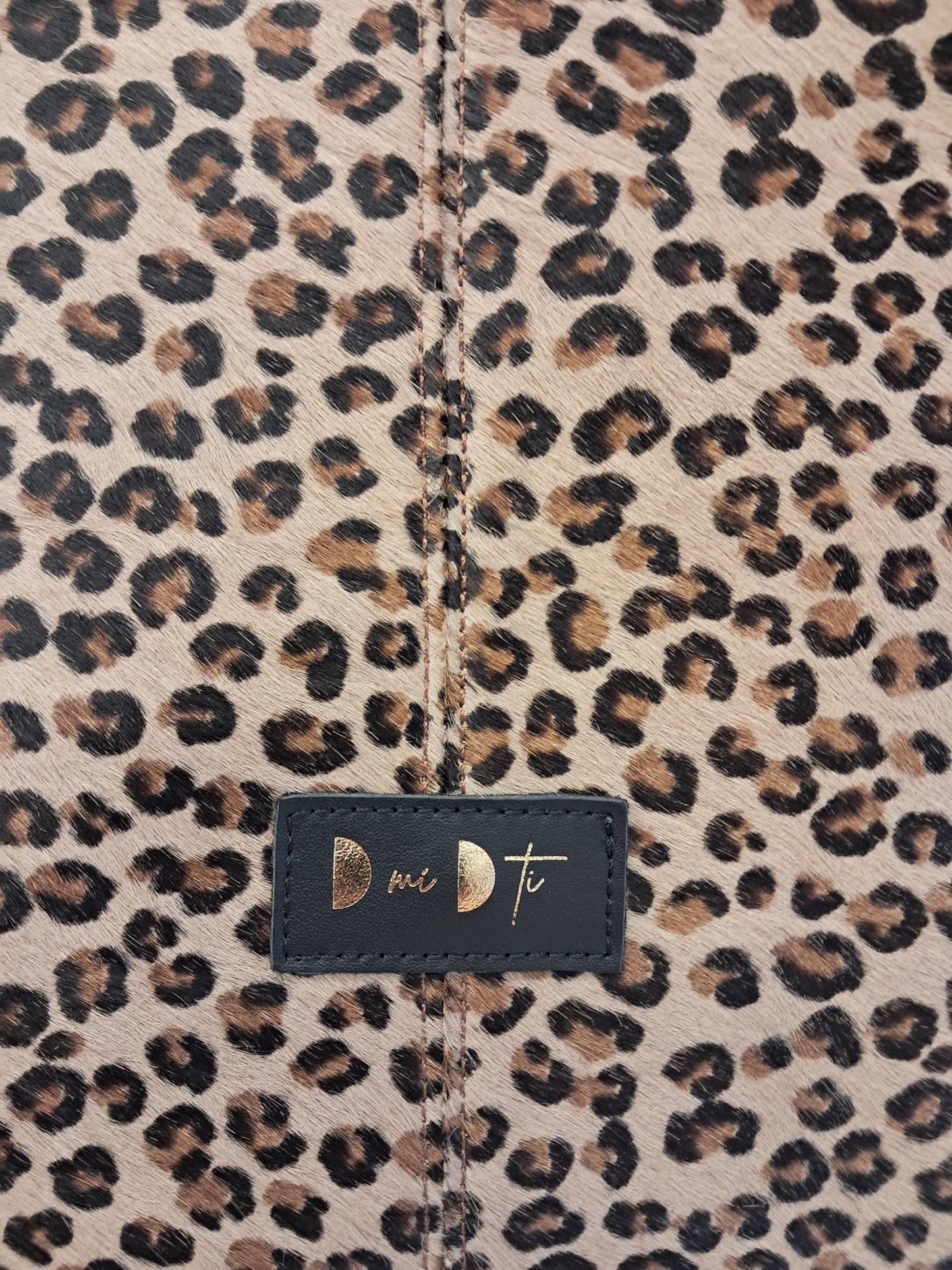 Bolso RAOS piel con pelo leopardo