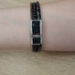 Pulsera piel de serpiente con abalorios verde y marrón