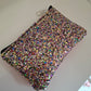 Monedero glitter y piel metalizada