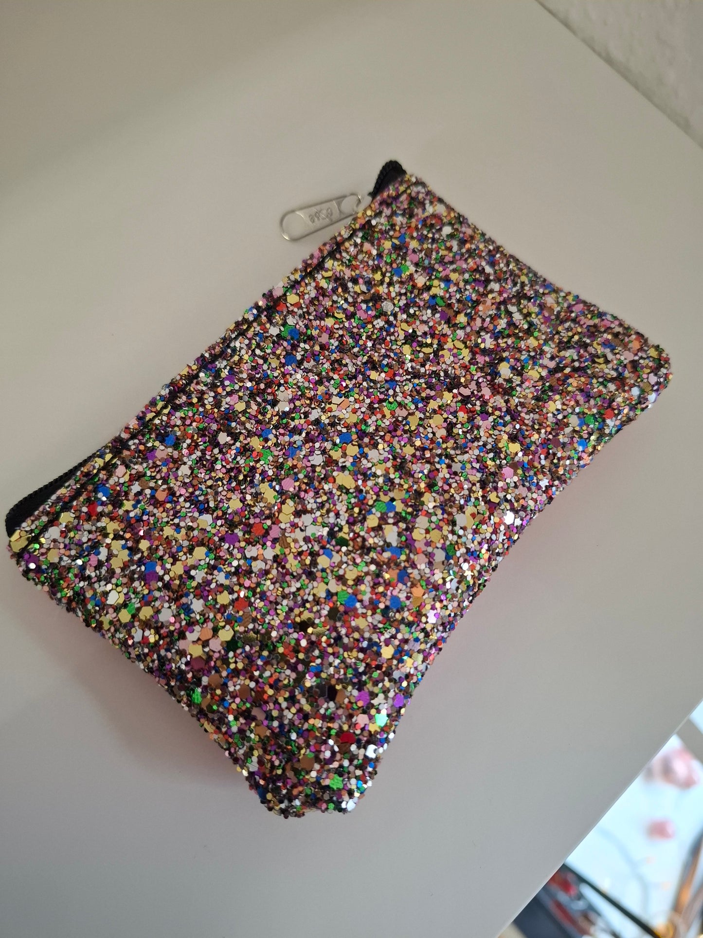 Monedero glitter y piel metalizada