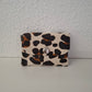 Monedero corchete piel con pelo leopardo