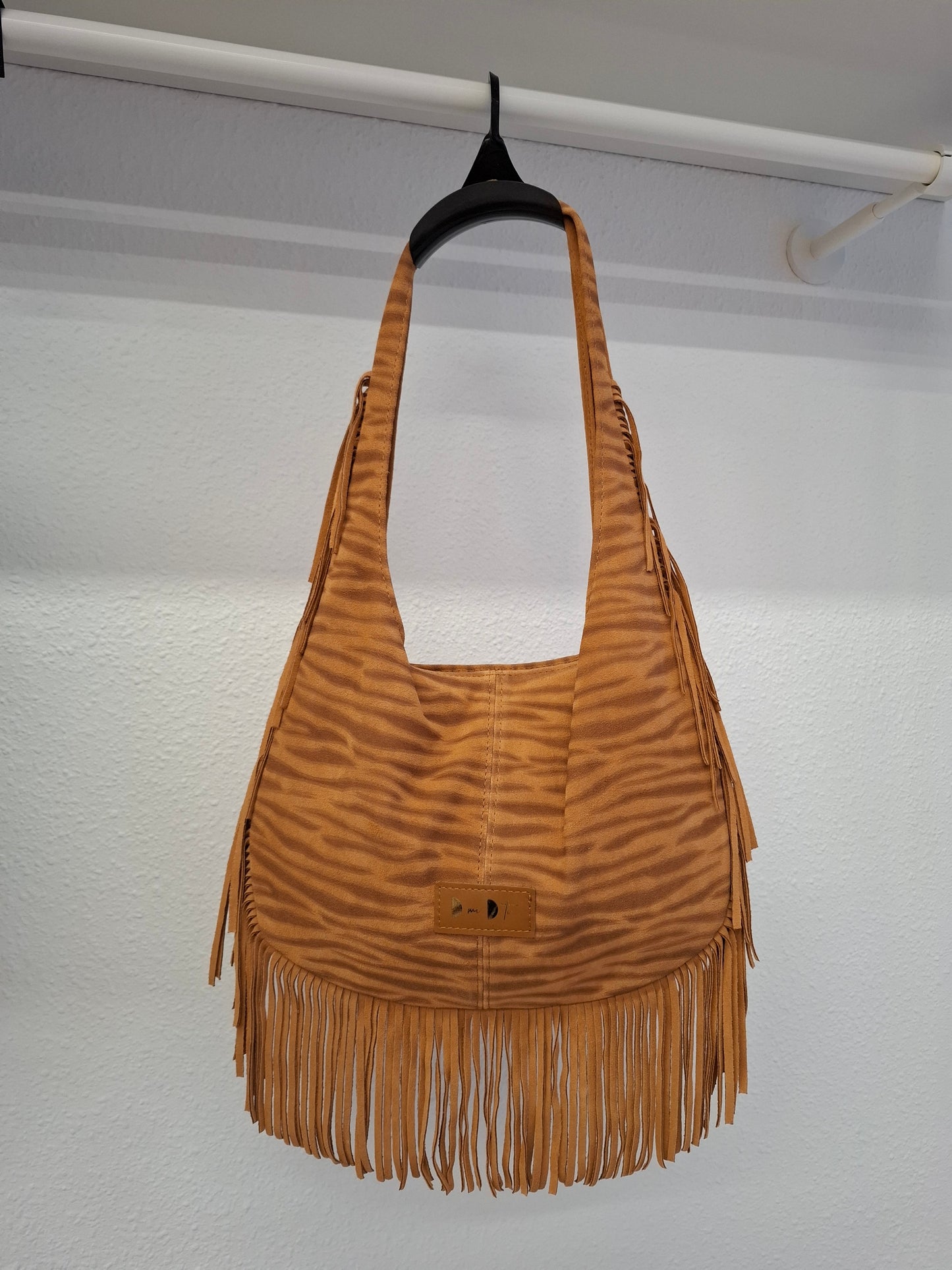 Bolso SOTO serraje flecos cebra camel