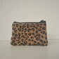 Monedero de piel con pelo leopardo marrón y negro