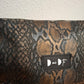 Bolso de mano DOBRA piel serpiente brillo cobre