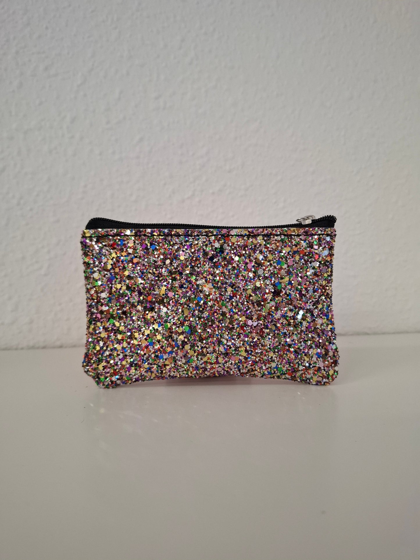 Monedero glitter y piel metalizada