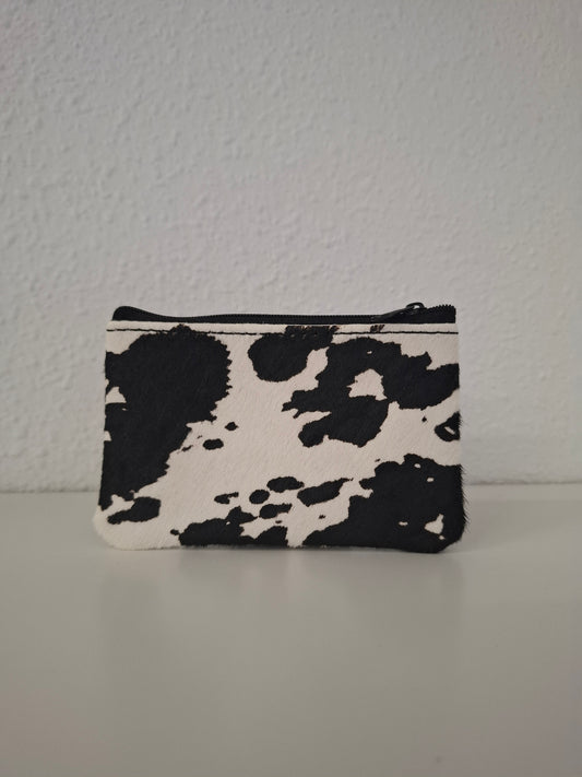 Monedero de piel con pelo negro vaca