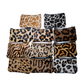 Monedero de piel con pelo animal print grande