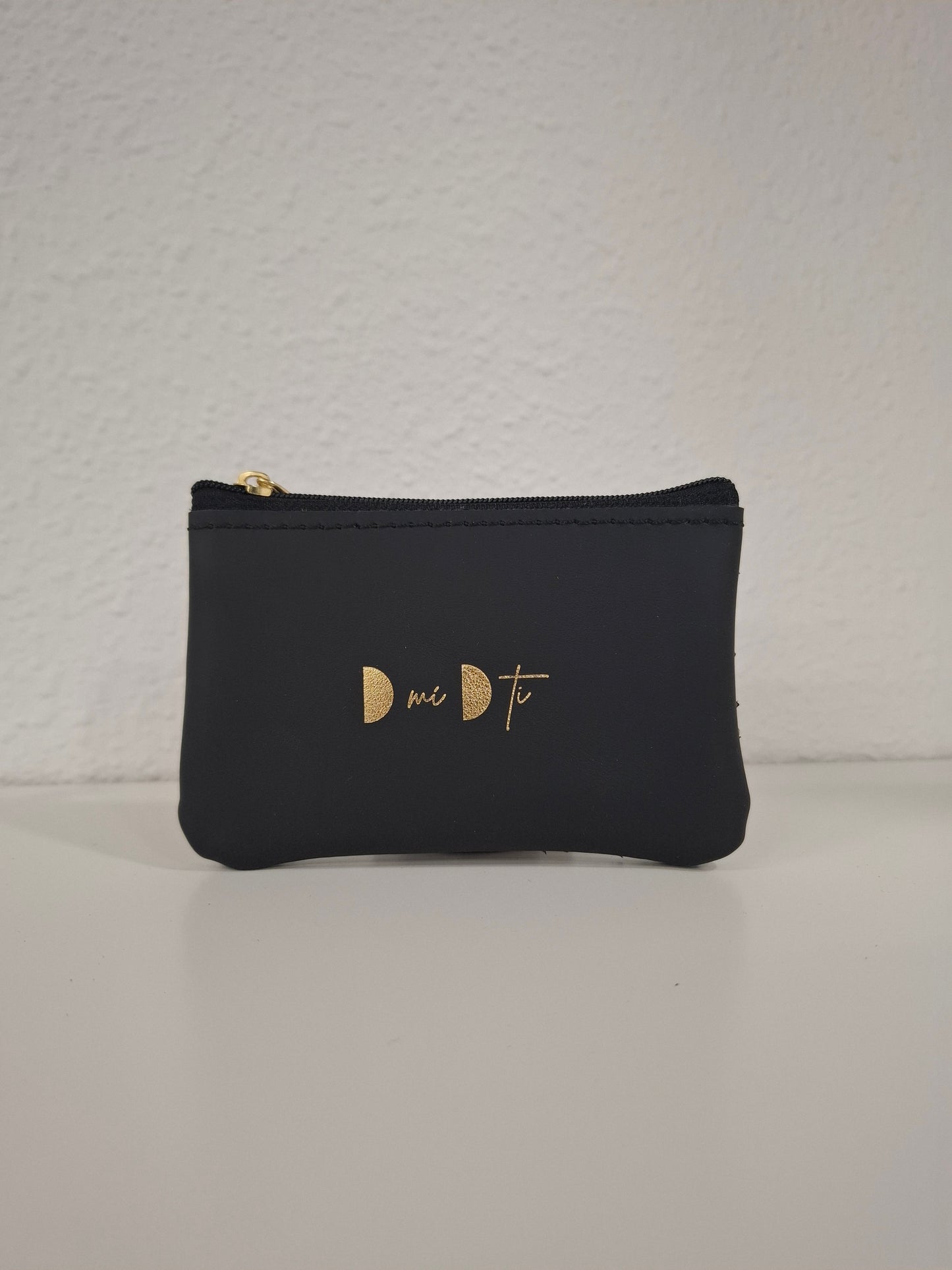 Monedero de piel marrón y negro serpiente